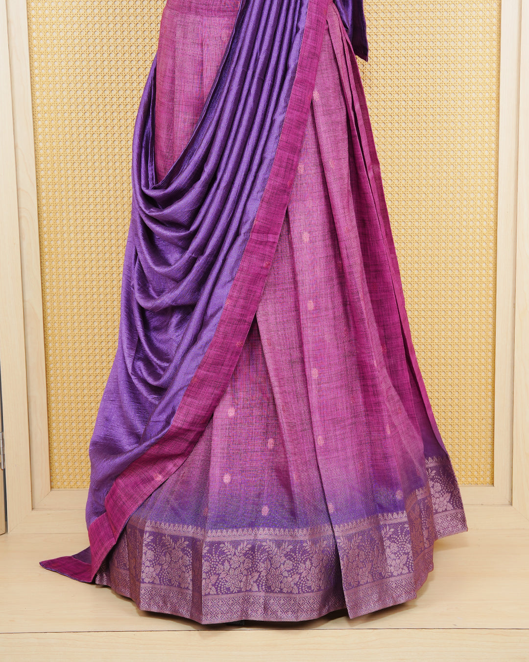 Pink & Purple colour Linen Silk Semi stitched dhavani set featuring buttas, zari bordered skirt & blouse piece and dupatta.
