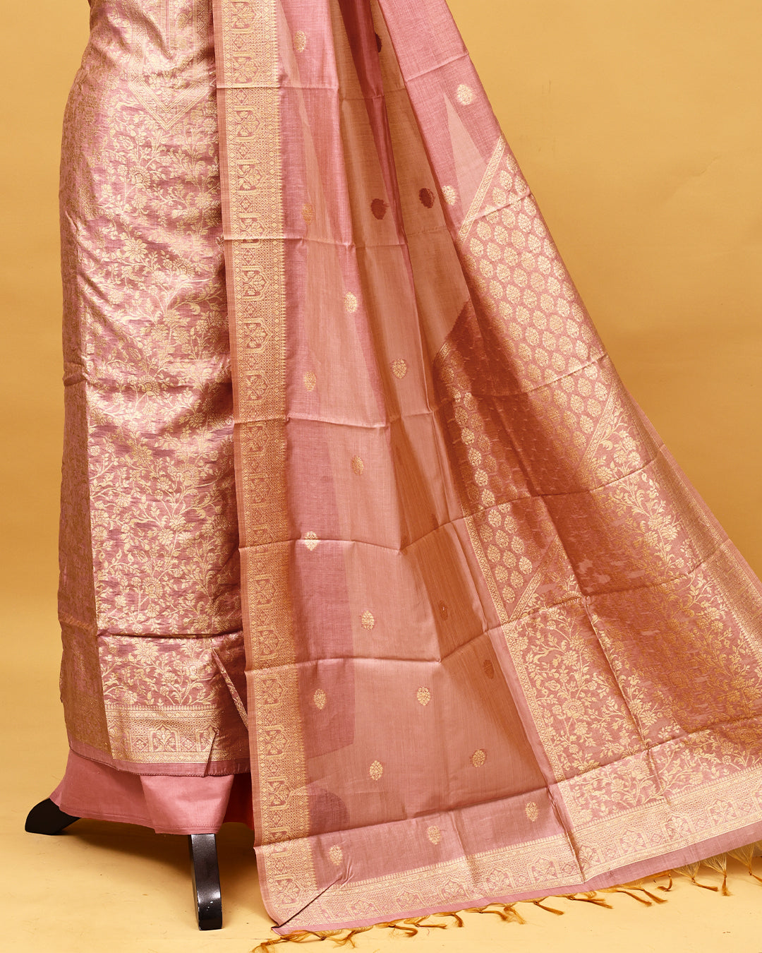 Pink colour Banaras Salwar material with gold zari floral kodi pattern work on body, matching bottom & Dupatta.
