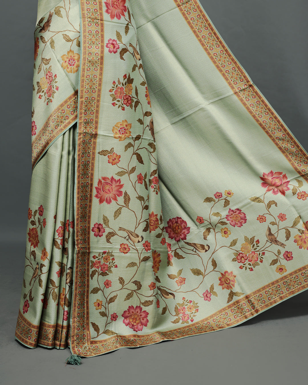 Mint Colour Pashmina Saree featuring a Patterned body, complemented by Self colour with Floral pattern & gold zari on border and Pallu, comes with matching blouse piece.