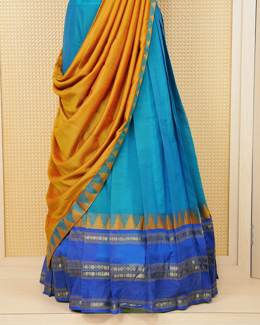 Peacock blue colour Chettinad Semi Stitched dhavani set Featuring blue with Gold zari on skirt, matching Blouse & Contrast dupatta.