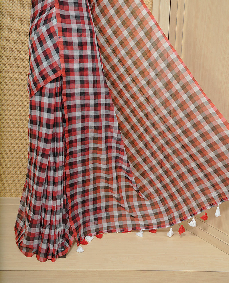 Black, Red & white Mul cotton saree featuring Small Check pattern across body, complemented by Elegant Tassels.