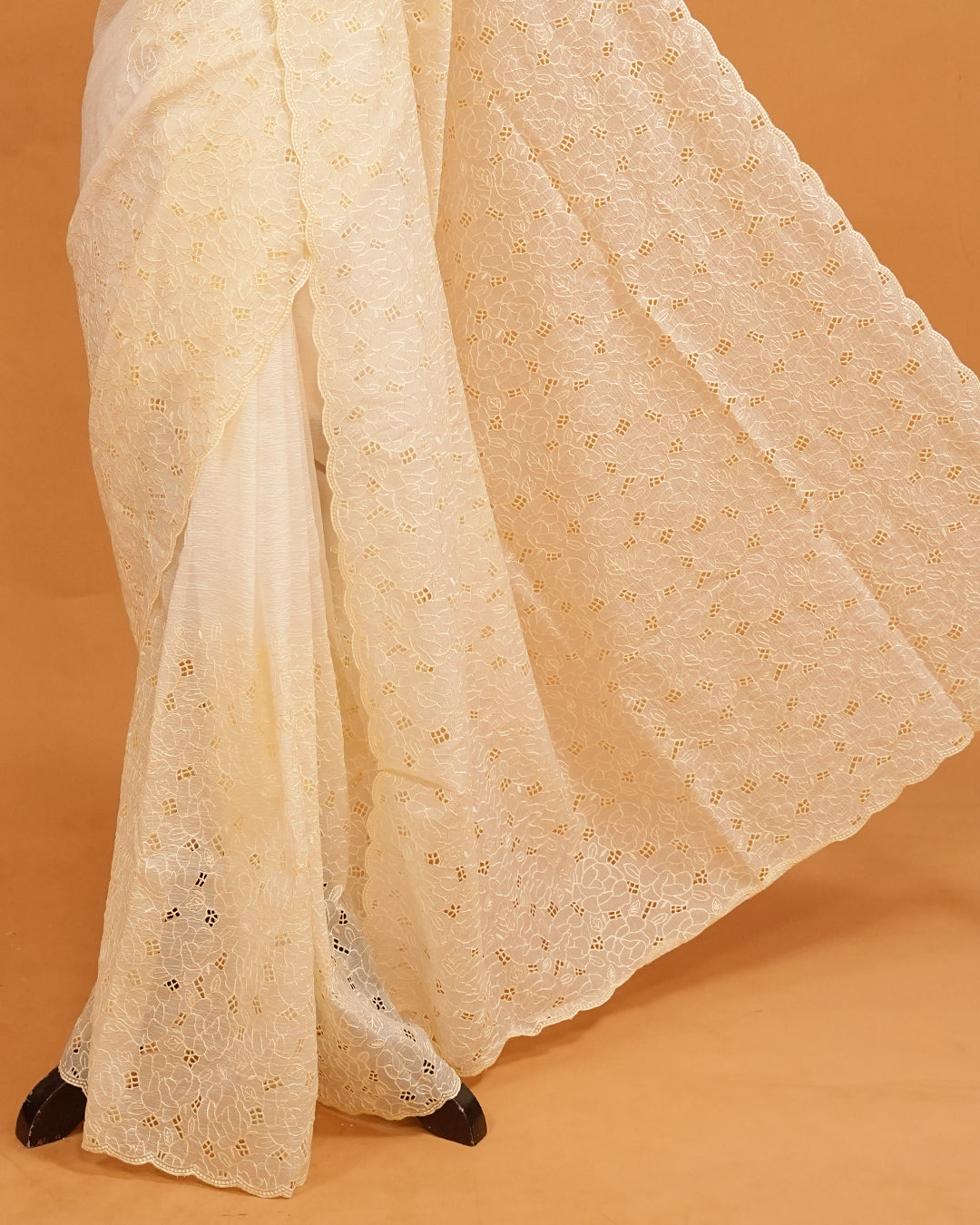 Cream colour Crush organza saree with Thread work.
