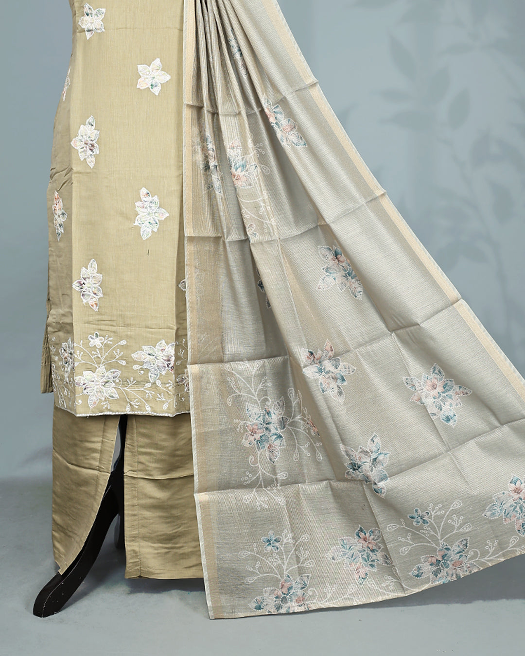 Pastel Olive colour Salwar set comes top with floral pattern on body, paired with matching bottom and dupatta.