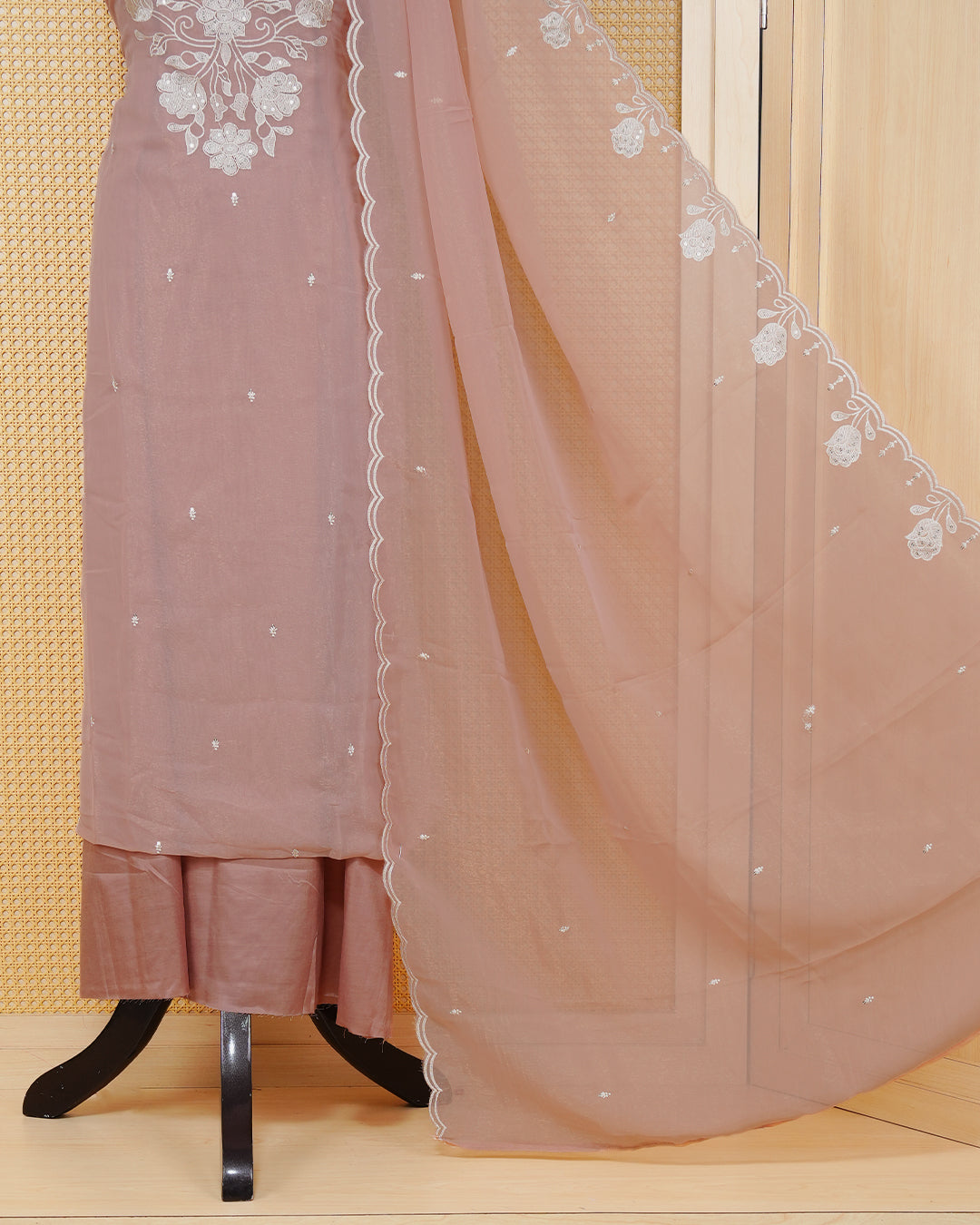 Dusty Rose Georgette Salwar Material Features an Inrcate Floral Emproidary Pattern Aborned With Shimmering Sequin Accents, paired with matching bottom & elegant Duptta
