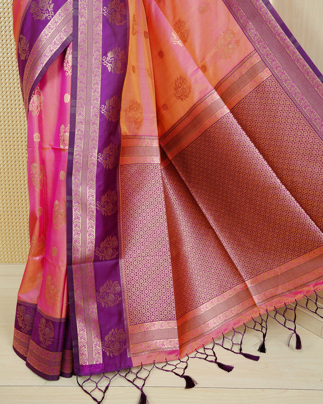 Peach & gold double shade Mulberry silk saree featuring gold floral zari patterns on body , paired with contrast purple colour with traditional border, comes with matching blouse piece.