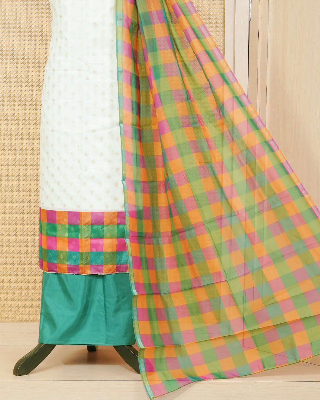 White & Teal Green Chanderi salwar material featuring Gold zari Small motifs on body and Check pattern body, paired with matching colour santoon bottom, elegant dupatta.