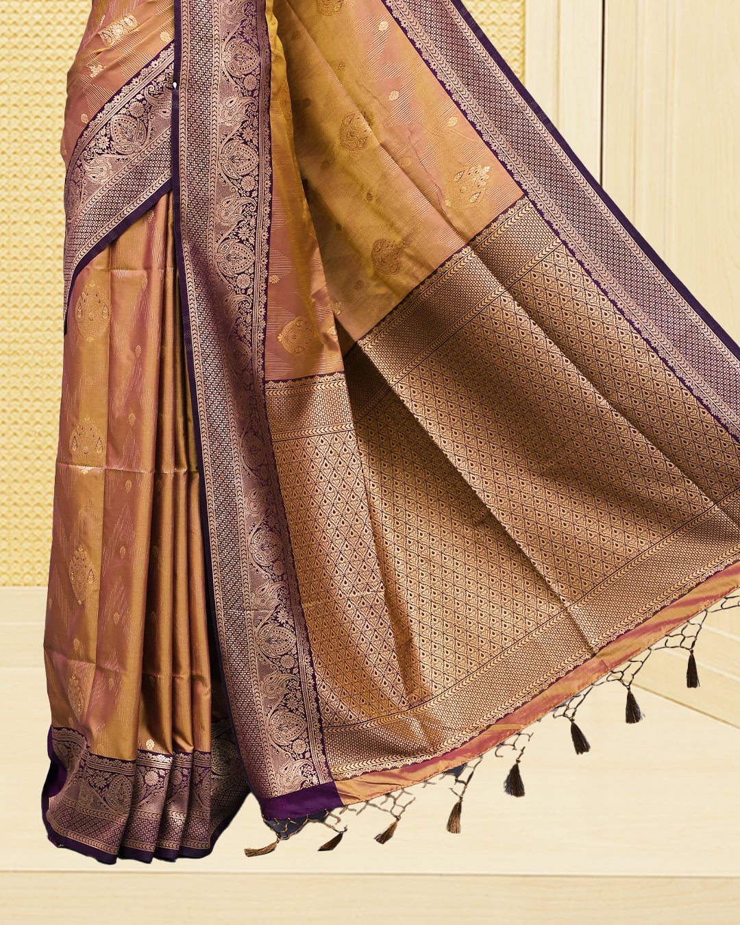 Brownze & gold double shade Mulberry silk saree featuring floral gold zari patterns on body, paired with contrast purple colour with traditional border, comes with matching blouse piece.