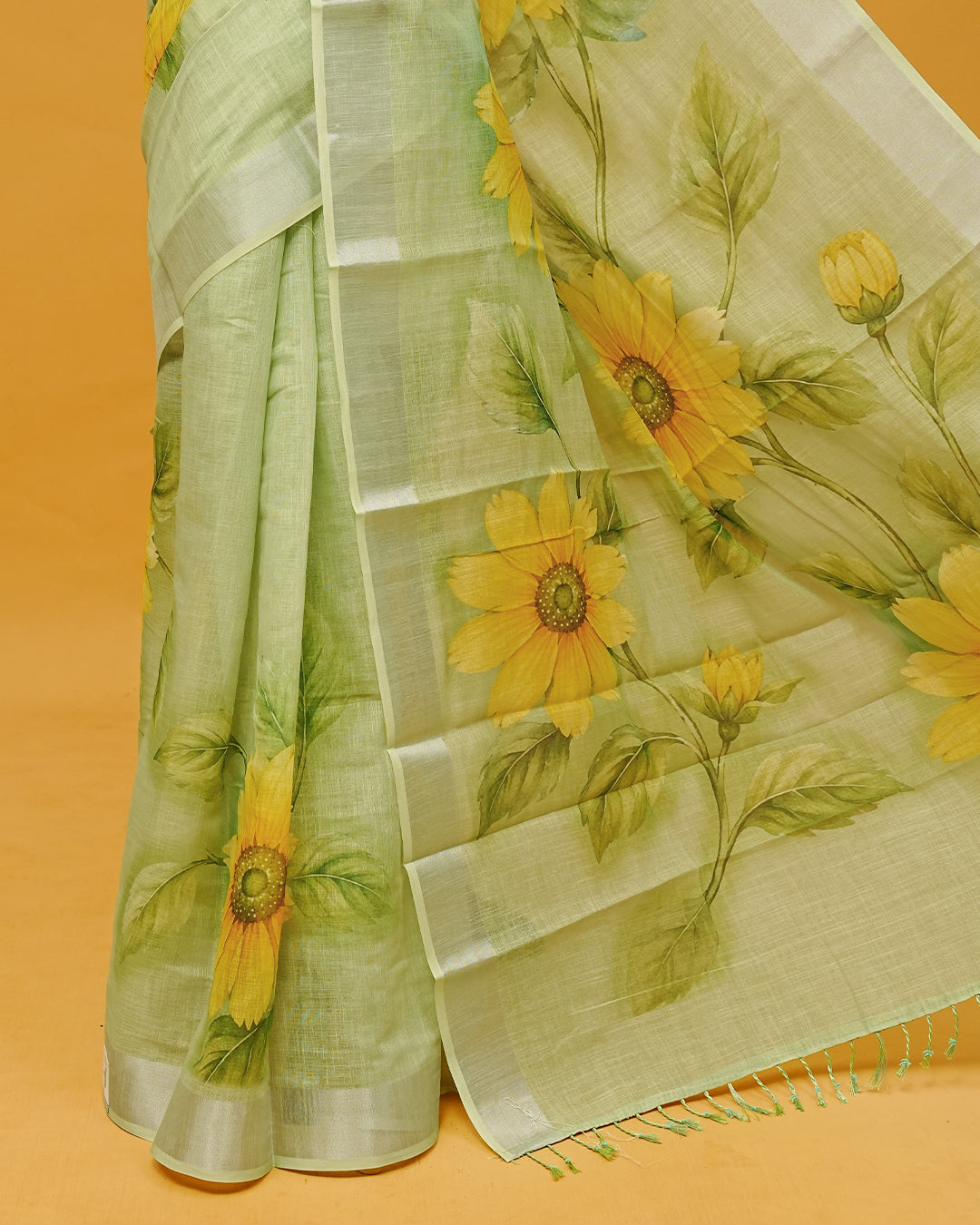 Piata Green Colour Semi Linen Saree featuring Sunflower prints, paired with matching blouse piece.