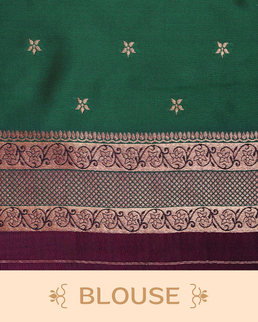 Maroon colour Mulberry silk saree featuring gold floral zari patterns on body, paired with contrast green colour with traditional border, comes with matching blouse piece.