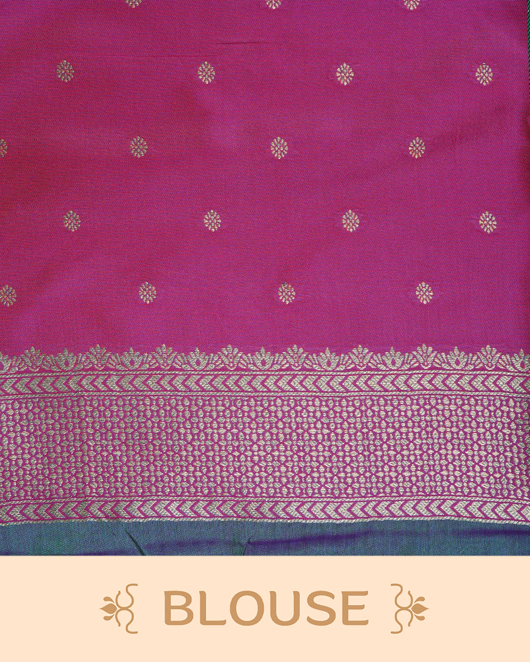 Green colour Mulberry silk saree featuring gold floral zari patterns on body, paired with contrast magenta colour with traditional border, comes with matching blouse piece.