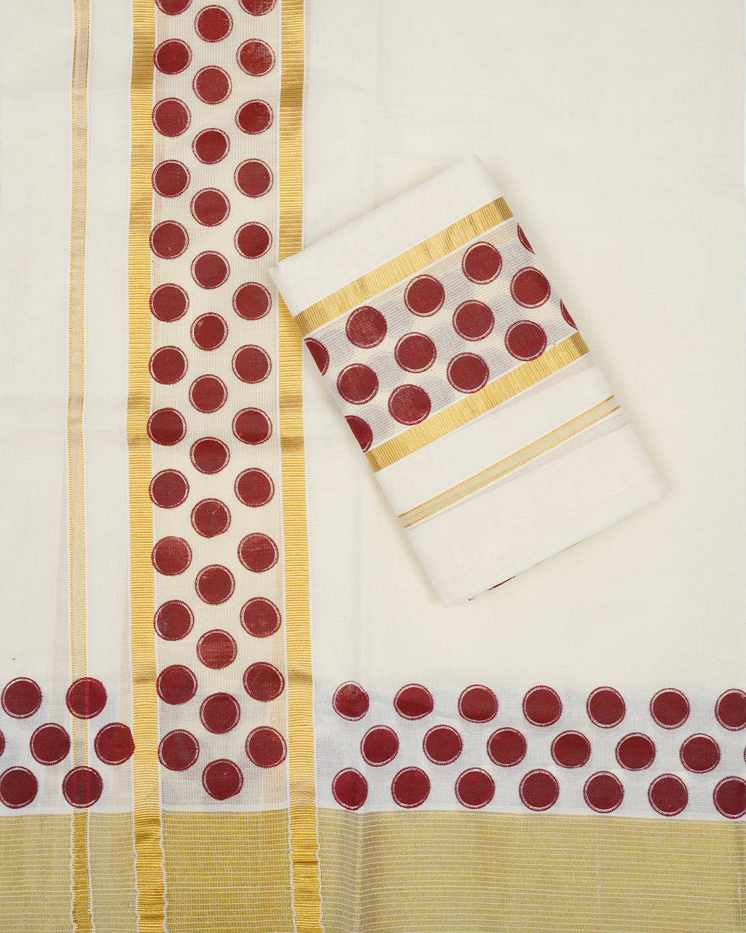 Cream colour cotton set mundu Features Plain body, Enhanced with Kasav kara with Brown colour circle motifs.