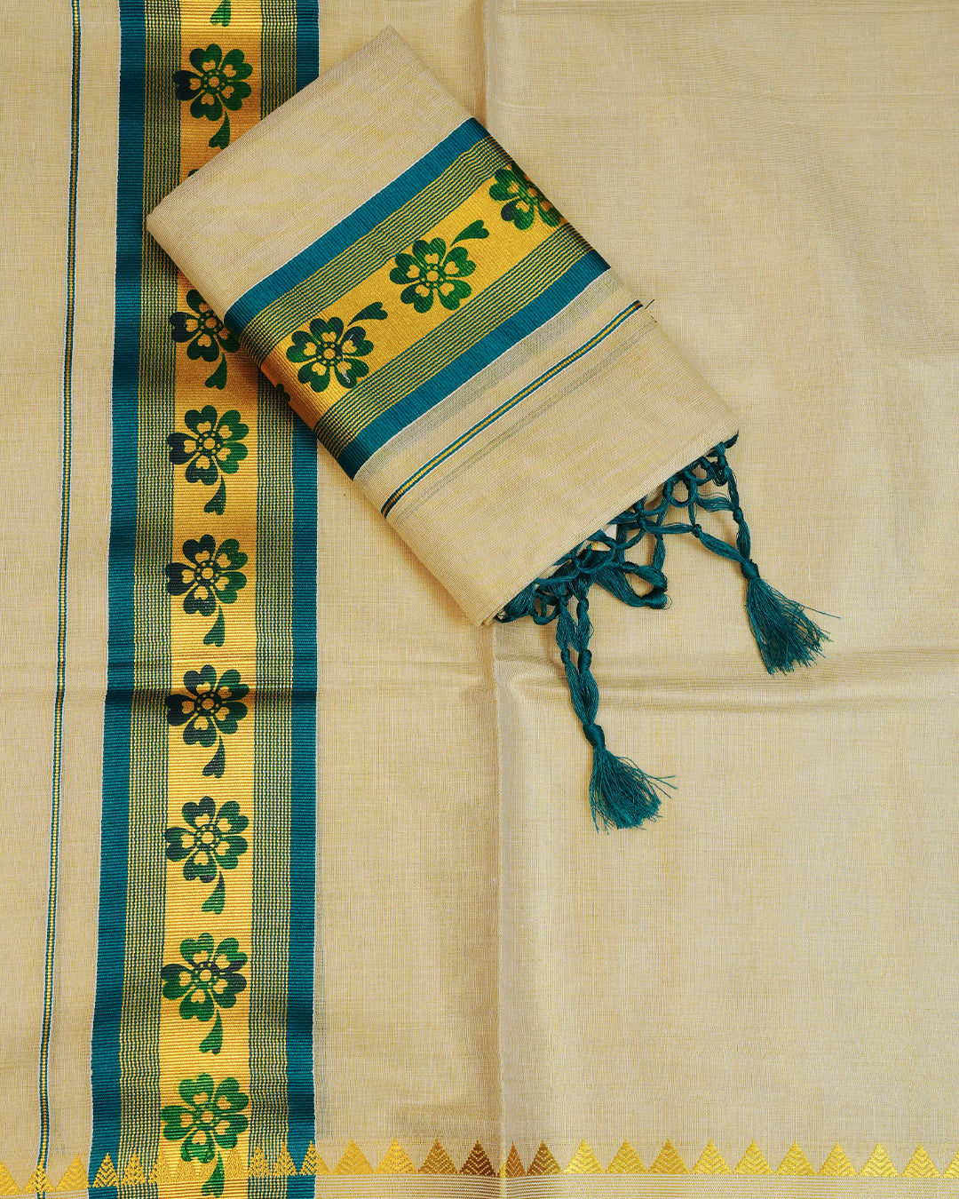 Gold Colour Tissue Set Mundu With elegant Plain body, enhanced with Teal With Gold kara.