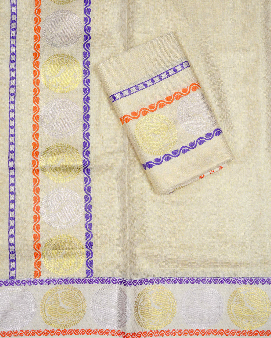 Golden colour Tissue silk set mundu features a plain body accented by a Blue, Orange with Gold & Rosegold Chakra Motifs on border.