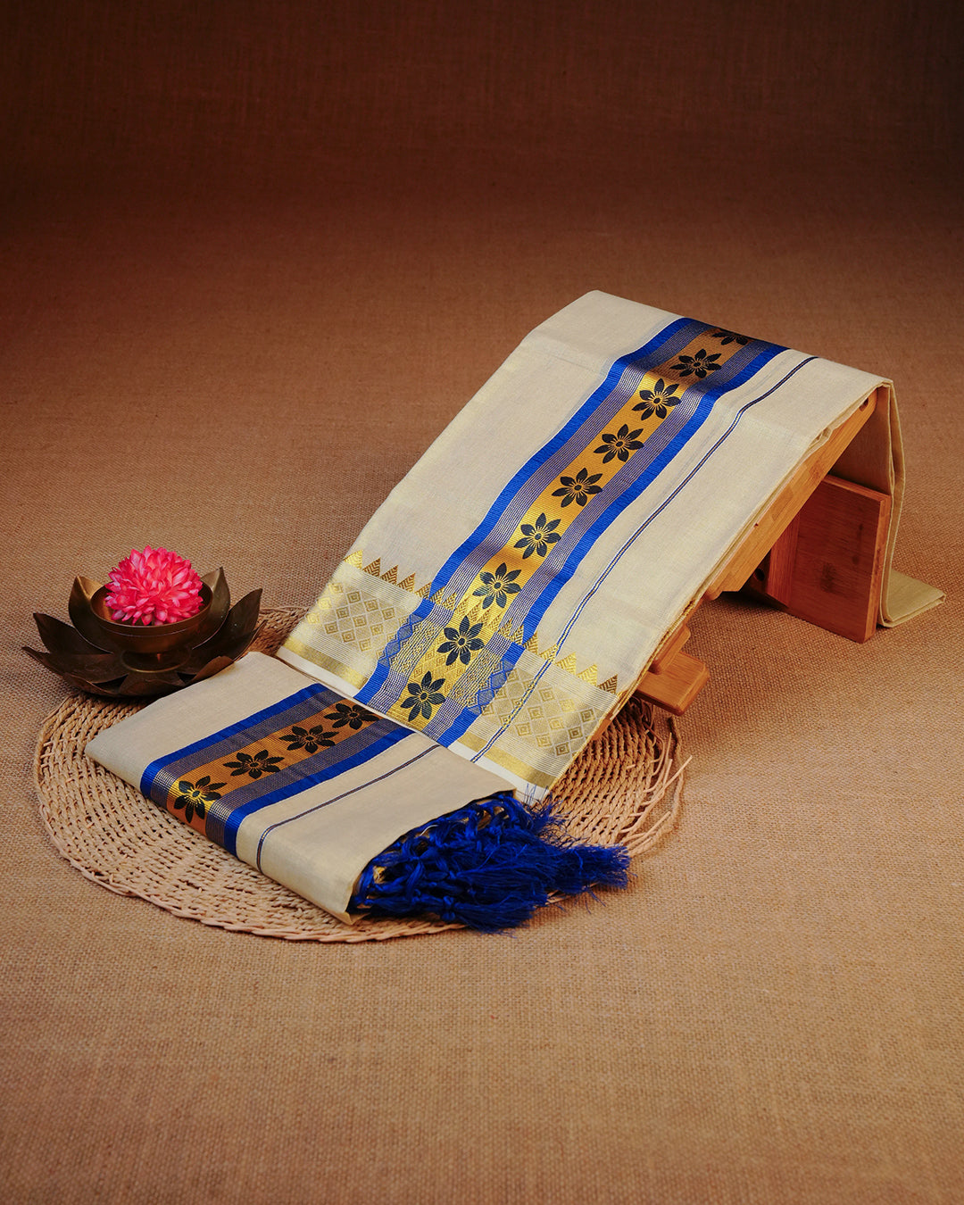 Cream colour Tissue silk set mund Featuring Elegant plain body, Complemented by Blue Floral print with Gold & blue zari border.
