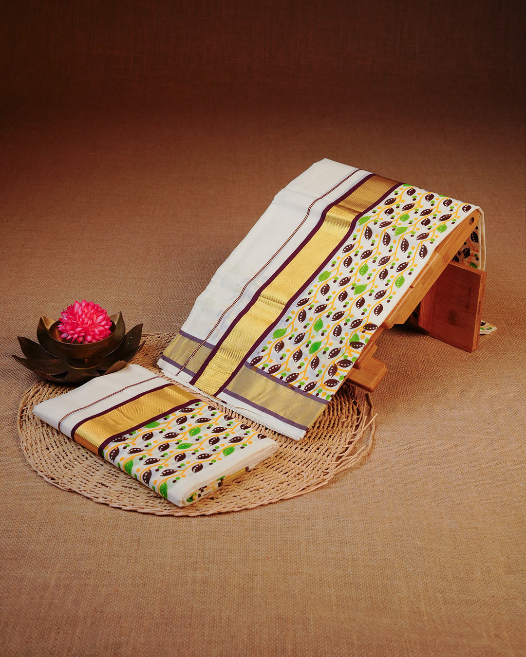 Cream colour cotton set mundu Featuring Plain, complemented by Multicolour kodi pattern With Gold & Dark chocolate colour border.