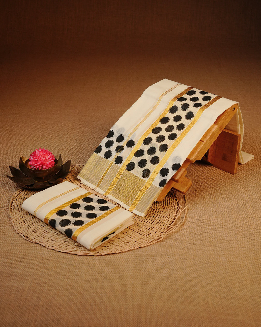 Cream colour cotton Set Mundu With Plain body, enhanced with gold Kasav With Black circle Printed kara.