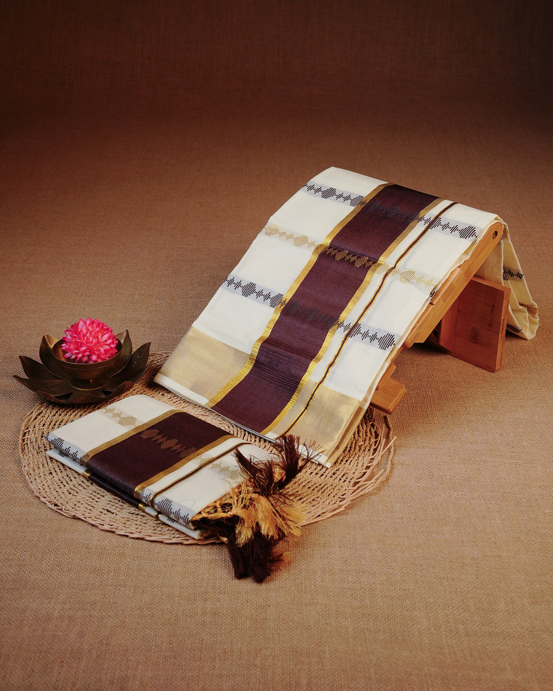 Cream colour cotton set mundu featuring Gold & Brown Strips on body, featuring Classic Brown & Gold Kasav kara.
