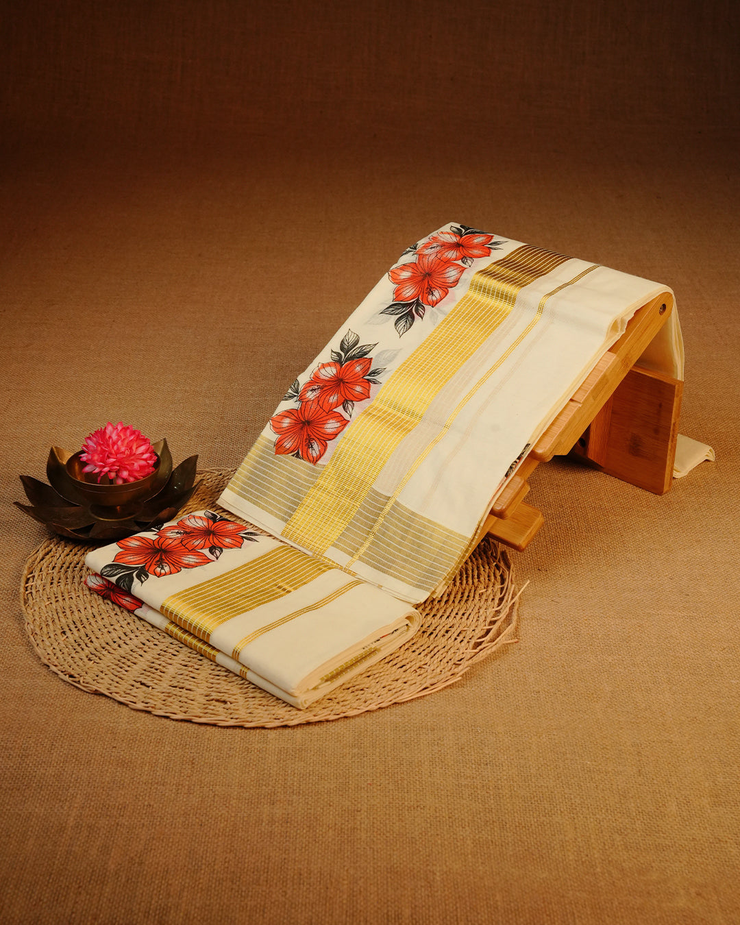 Cream colour cotton Set Mundu With Plain body, enhanced with gold Kasav With Floral Printed kara.