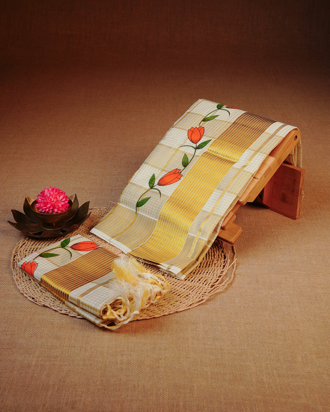 Cream colour cotton set mundu Featuring Gold zari check on body, complemented by Gold with Floral print kara.