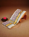 Cream colour cotton set mundu Featuring Plain, complemented by Multicolour kodi pattern With Gold & Green colour border.