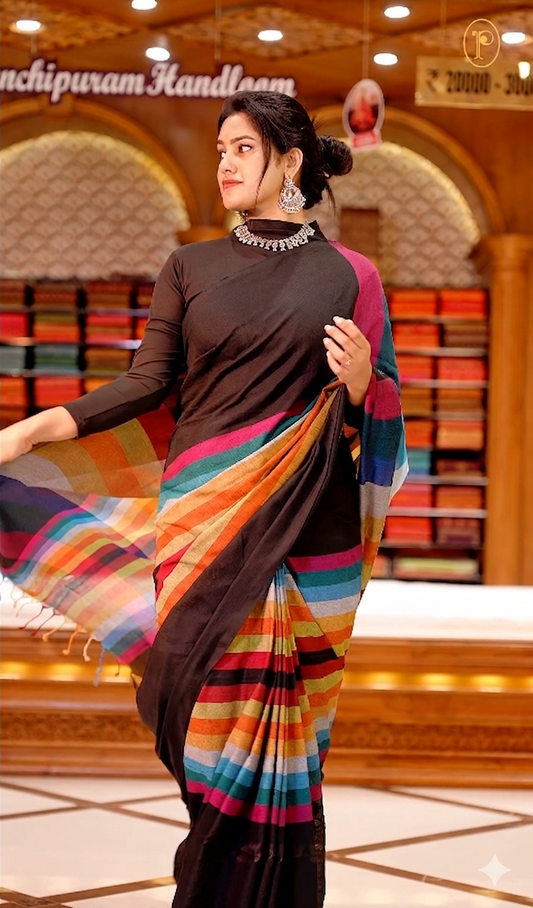 Black Colour Mul Cotton Saree featuring Multi colour Line pattern on body, enhanced with Multi colour Pallu.