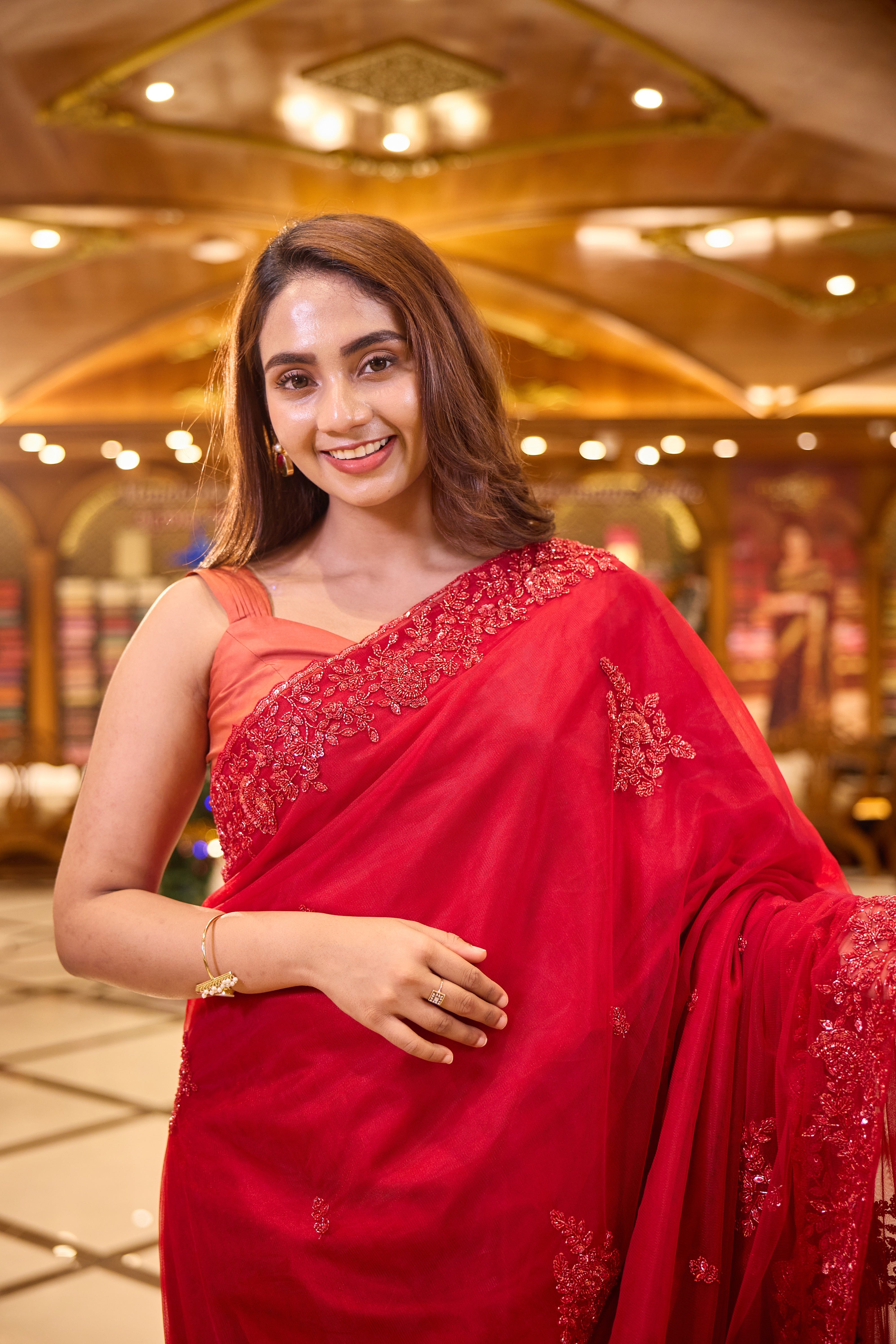 Cherry Red colour Hand dyed Premium Designer Saree, crafted in full net fabric with intricate self colour thread and bead embroidery, finished with an elegant scallop border and paired with a matching worked blouse.