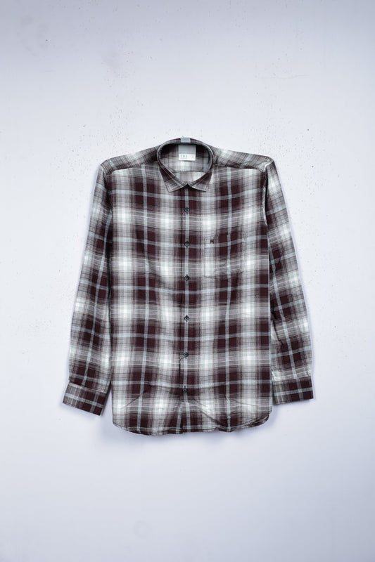 White colour shirt designed with brown colour check pattern on body, adored with full sleeve.