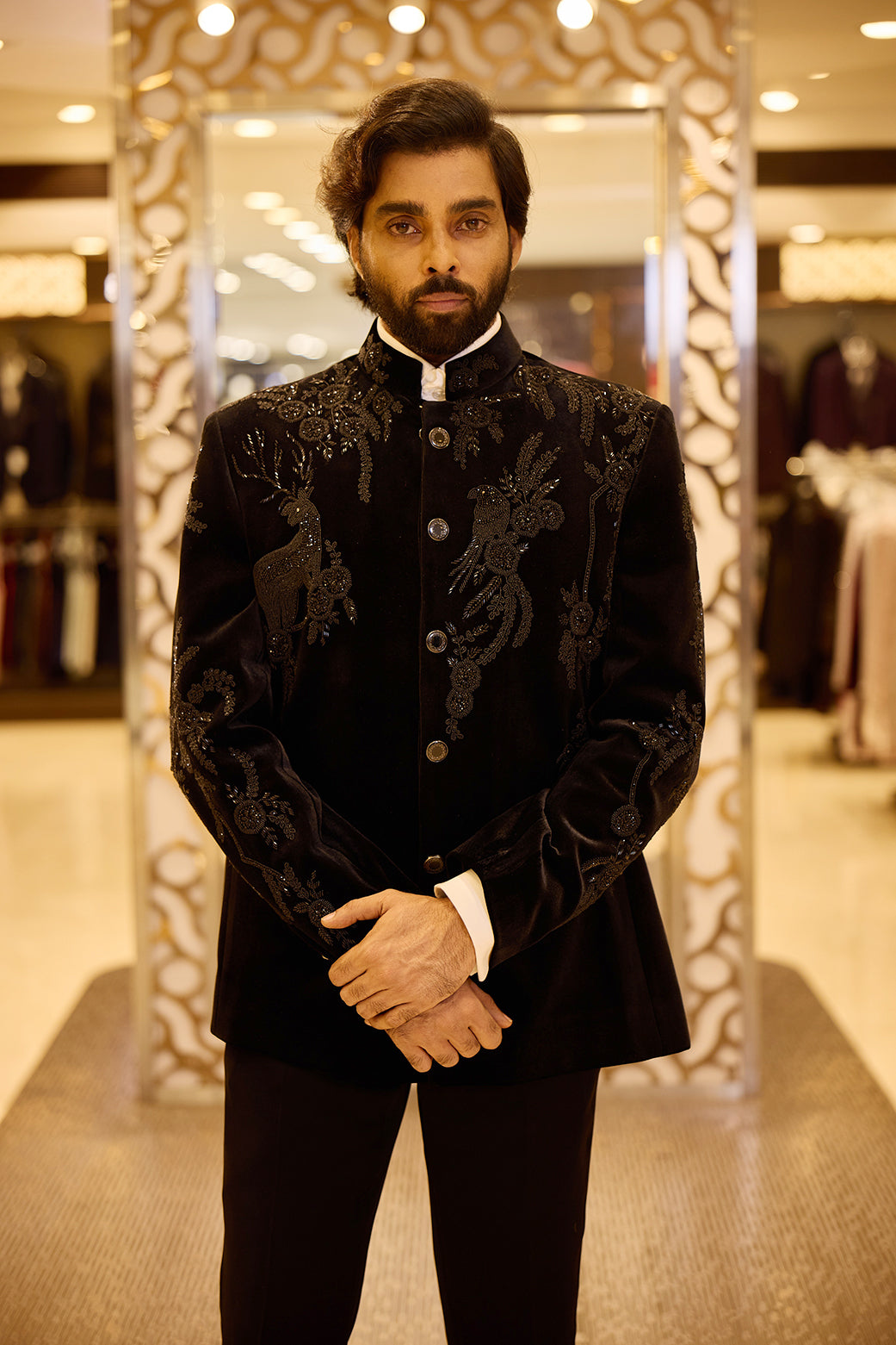 Rich black Colour Hallmark Velvet groom wear, showcasing its plush dense pile and shimmering light-changing sheen, enhanced with intricate embroidery for a luxurious and regal wedding look.