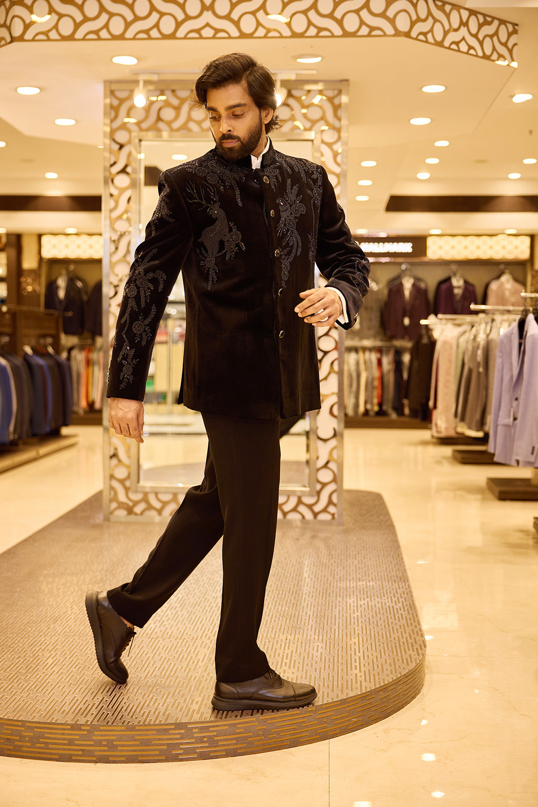 Rich black Colour Hallmark Velvet groom wear, showcasing its plush dense pile and shimmering light-changing sheen, enhanced with intricate embroidery for a luxurious and regal wedding look.