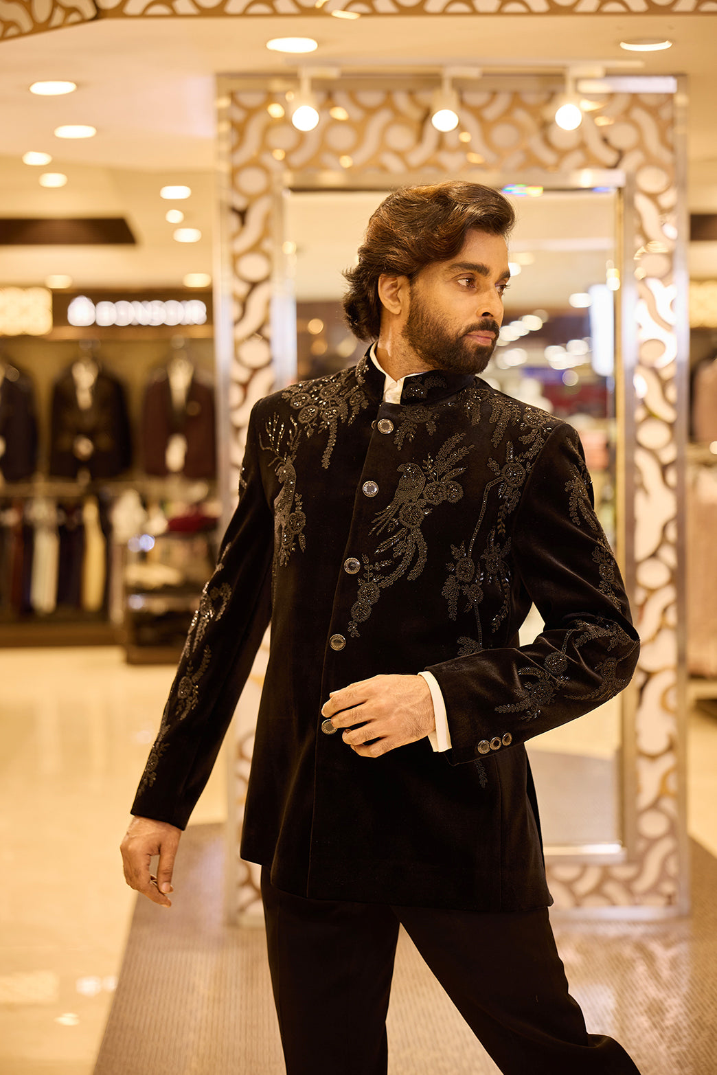 Rich black Colour Hallmark Velvet groom wear, showcasing its plush dense pile and shimmering light-changing sheen, enhanced with intricate embroidery for a luxurious and regal wedding look.