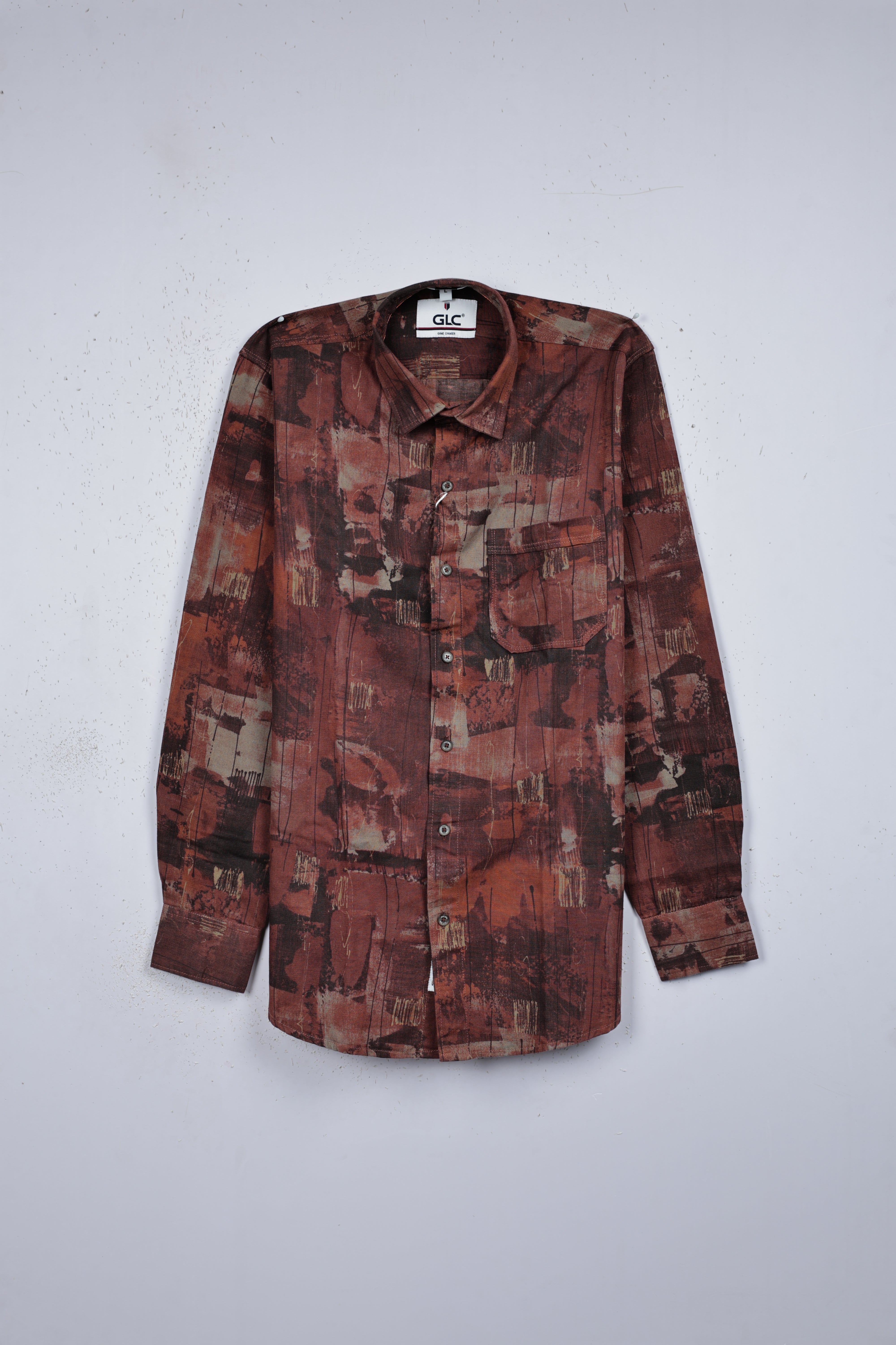 Brown colour shirt designed with multicolour print on body, adored with full sleeve.