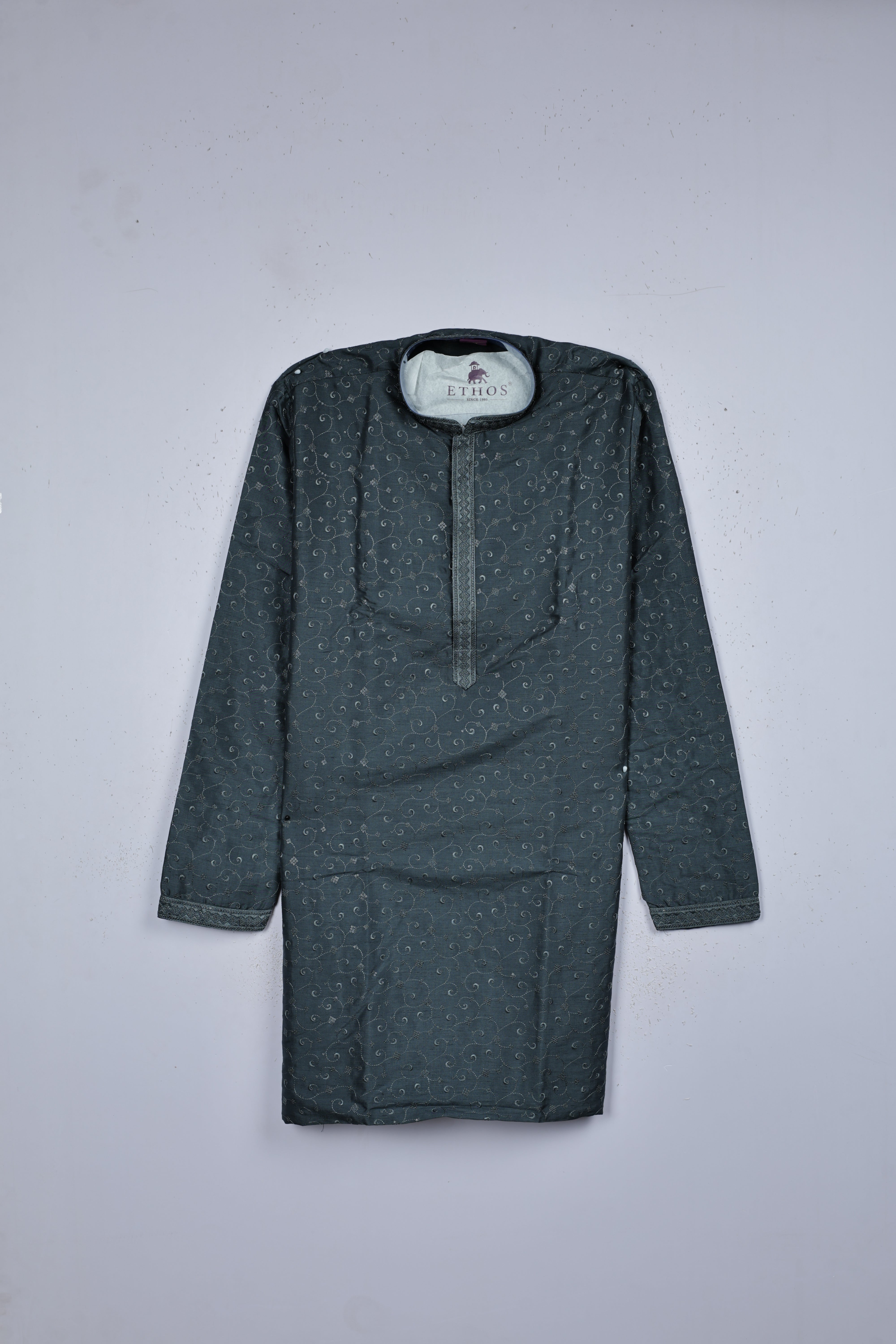 Grey colour self featuring self color thread & sequins on body, colour design neck, adored with full sleeve.