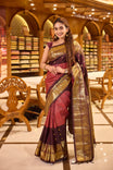 Maroon & Brown Shade Kanchipuram Traditional Handloom Silk Saree featuring vaira oosi zari checks on the body with contrasting Mayuri chakra motifs woven in rich antique gold zari, elegantly finished with a classic gold zari border.