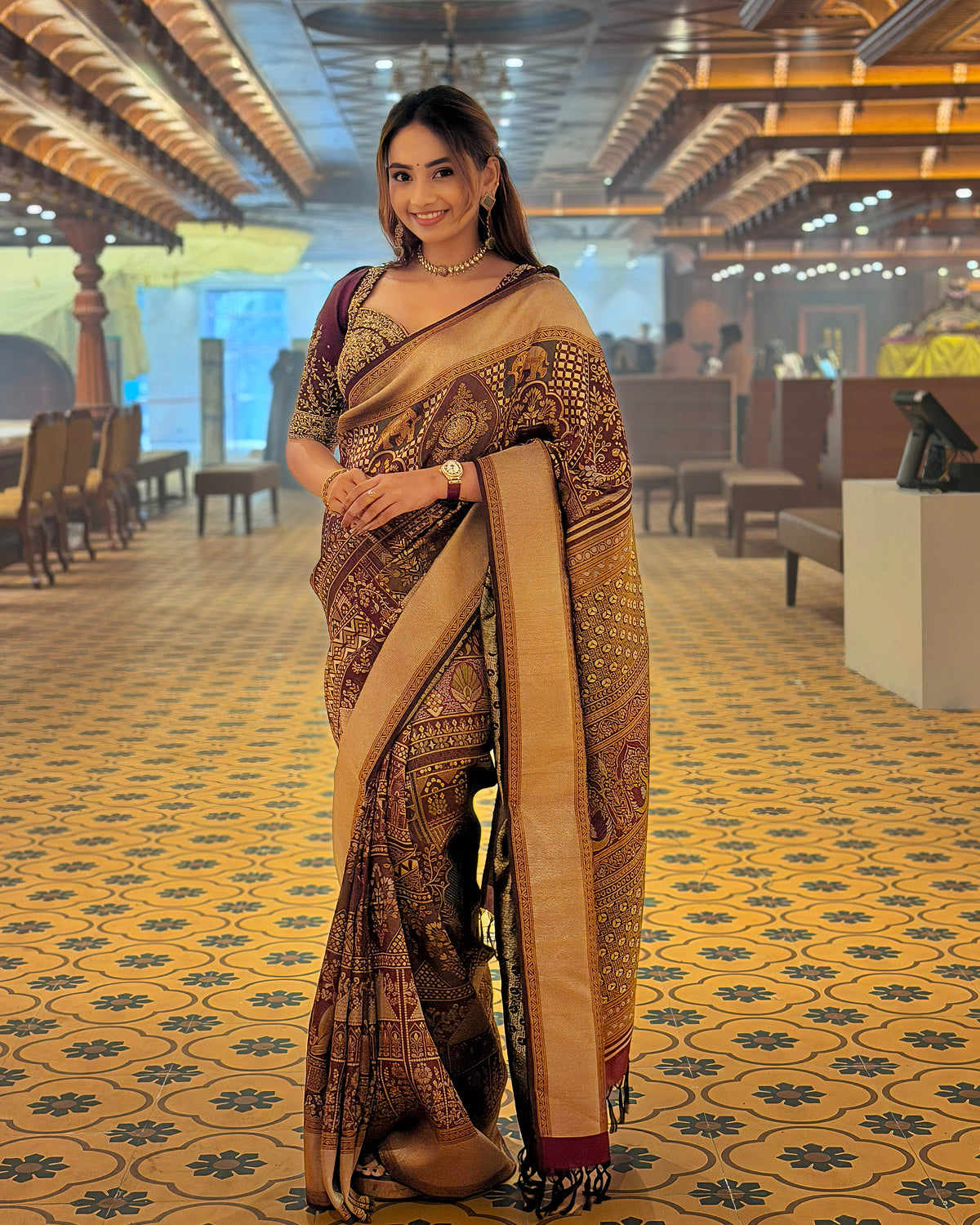Wine Maroon Pure Handloom Kancheepuram Samudrika Pattu Saree featuring Mughal-inspired Meenakari patterns on the body, a tissue-turning pallu, and a matching blouse piece.