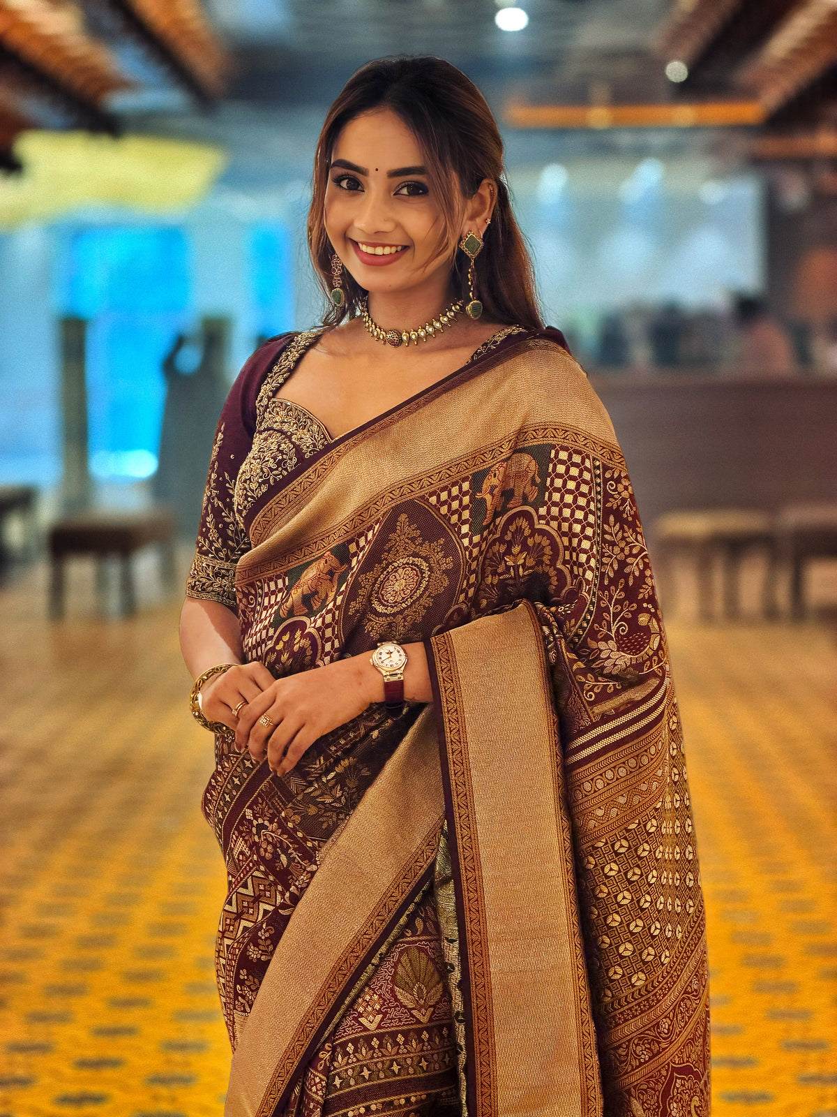 Wine Maroon Pure Handloom Kancheepuram Samudrika Pattu Saree featuring Mughal-inspired Meenakari patterns on the body, a tissue-turning pallu, and a matching blouse piece.