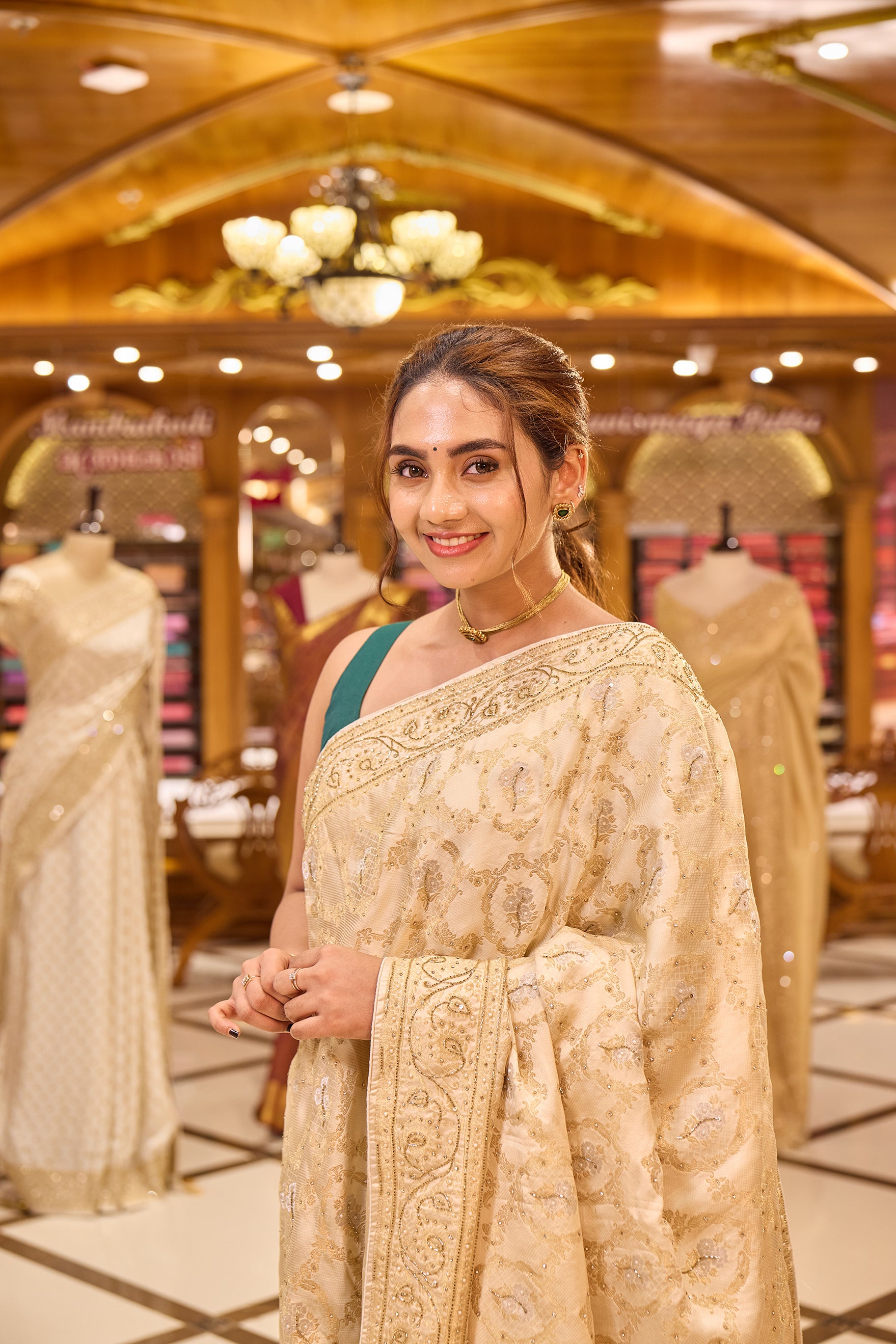 Ivory Colour Satin Banaras Crepe Silk Saree with All woven Traditional Jaal Weave and Silver Meena Motifs, Featuring Hand Beadwork on Pallu and Border, Paired with Matching Blouse Piece.