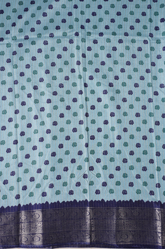 Blue colour dolla silk saree adorned with beautiful kalamkari prints, complemented by a rich golden zari border & The pallu features intricate kalamkari detailing, paired with a matching blouse.