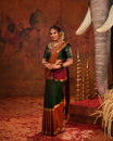 Traditional Mubbakam Kanchipuram Pure Silk Saree, handwoven with rich pure zari detailing. Featuring a classic green and maroon colour combination, enhanced with elegant traditional zari borders and pallu.