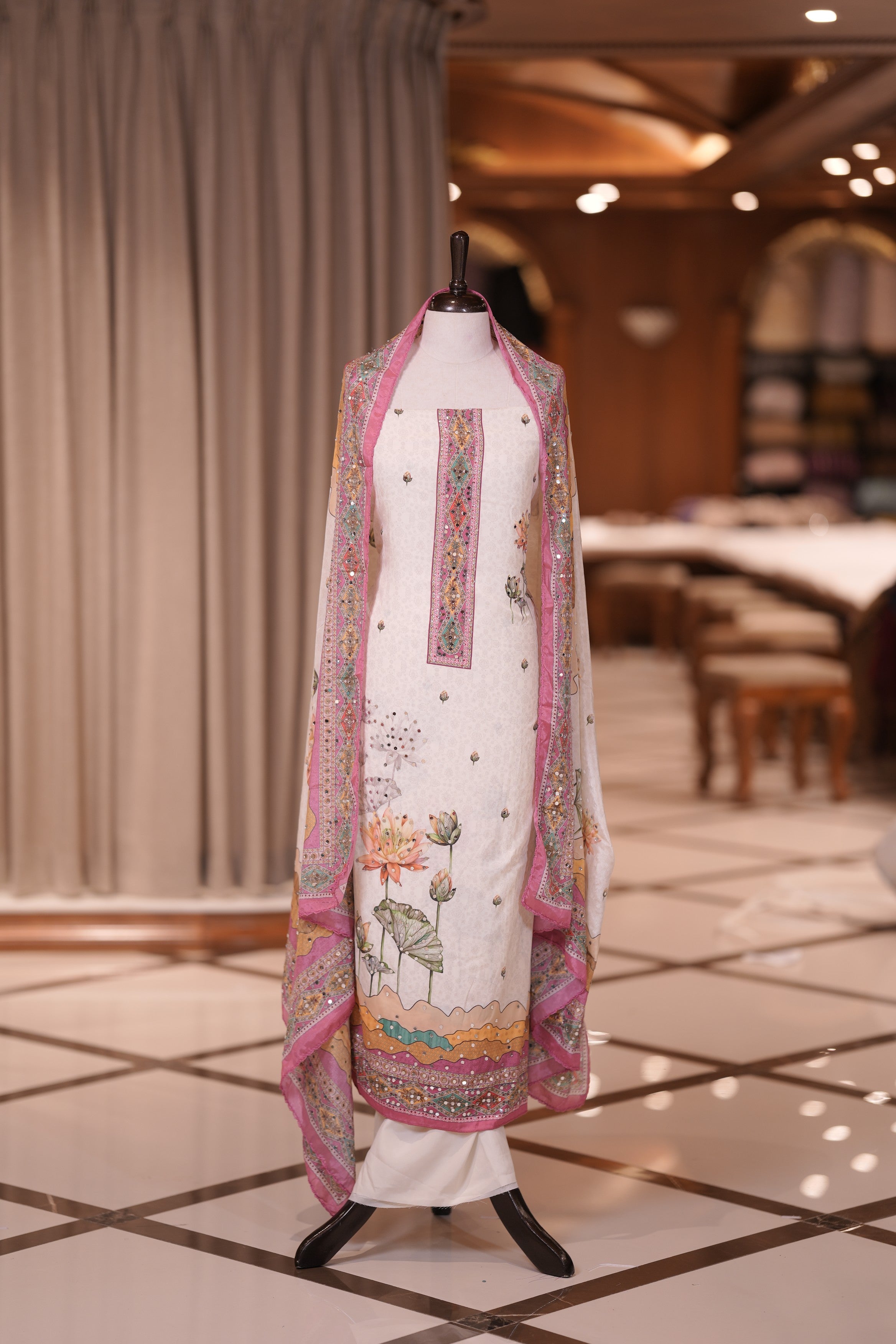 Pink Colour Crepe Material Top Embellished with Elegant Lotus Print and Mirror Work, Paired with a Matching Designed Dupatta and Plain Bottom