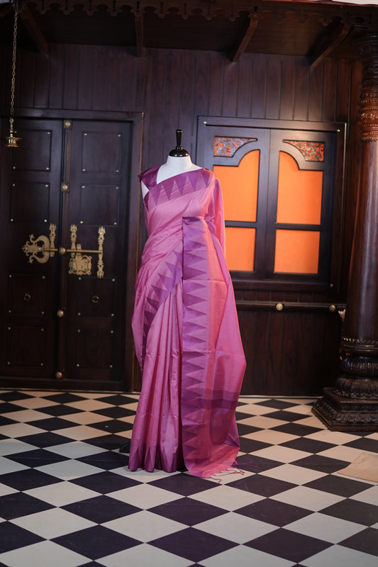 Pink colour Net cotta saree featuring a striped body with a contrast colored traditional temple-design border, a striped pallu, and paired with a matching blouse.