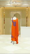 Orange colour georgette salwar suit material featuring intricate Blue floral thread embroidery on the neckline and side opening, complemented with a matching bottom and dupatta. Comes with lining included for added comfort and finish.