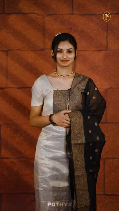 Black Colour Soft Tissue Salwar Material Featuring Elegant Beige Work On The Neck, Complemented By A Contrast Bottom And A Semi Banarasi Dupatta.