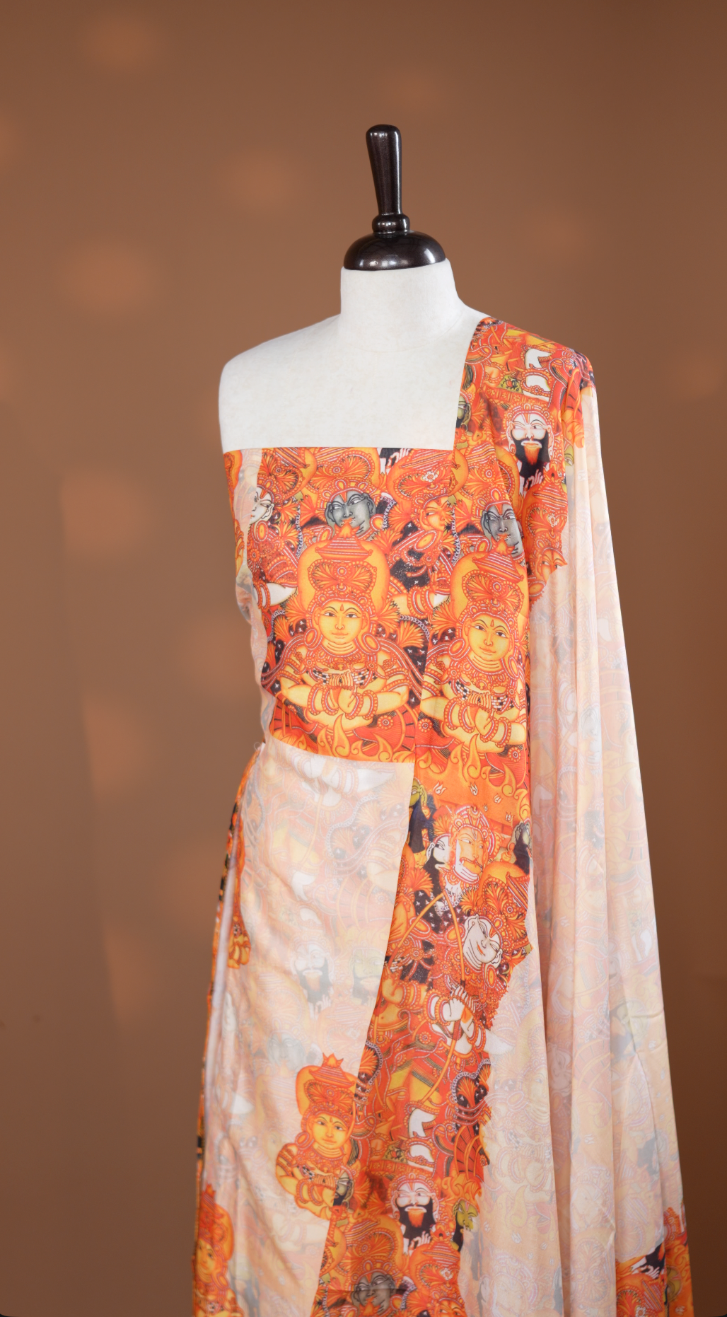 Cream colour salwar material Featuring Indian Art forms Print on body, paired with matching bottom & Elegant Dupatta.