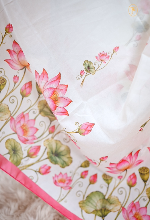 Cream colour Vijithra Silk Material Featuring Pink Lotus Print On body, comes with same colour Dupatta Enhance Beautiful Floral print with small Pink  border.