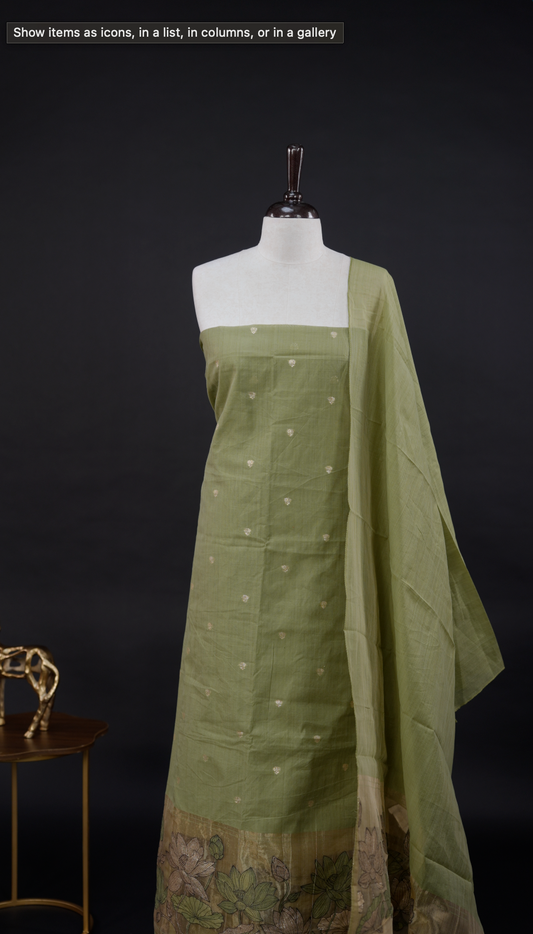 Olive green Semi chanderi salwar material featuring Gold small Buttas on body, Daman borderi with lotus Design, same pattern dupatta, santoon bottom.