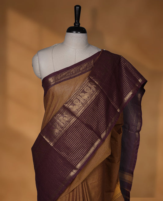 Mustard colour Chettinad cotton saree with a plain body, featuring a traditional border and pallu in contrast maroon colour, paired with a matching blouse piece.