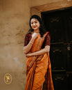 Mustard colour Chettinad cotton saree with a Checks on body, featuring a traditional border and pallu in Maroon colour, paired with a matching blouse piece