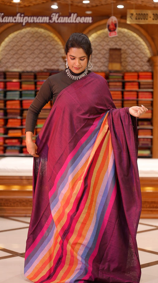 Grape Colour Mul Cotton Saree featuring Multi colour Line pattern on body, enhanced with Multi colour Pallu.