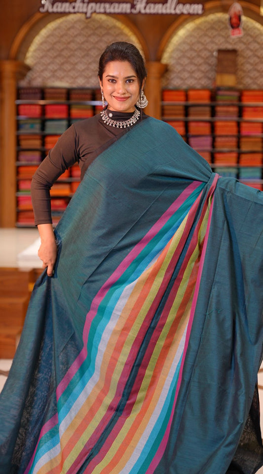 Peacock Blue Colour Mul Cotton Saree featuring Multi colour Line pattern on body, enhanced with Multi colour Pallu.