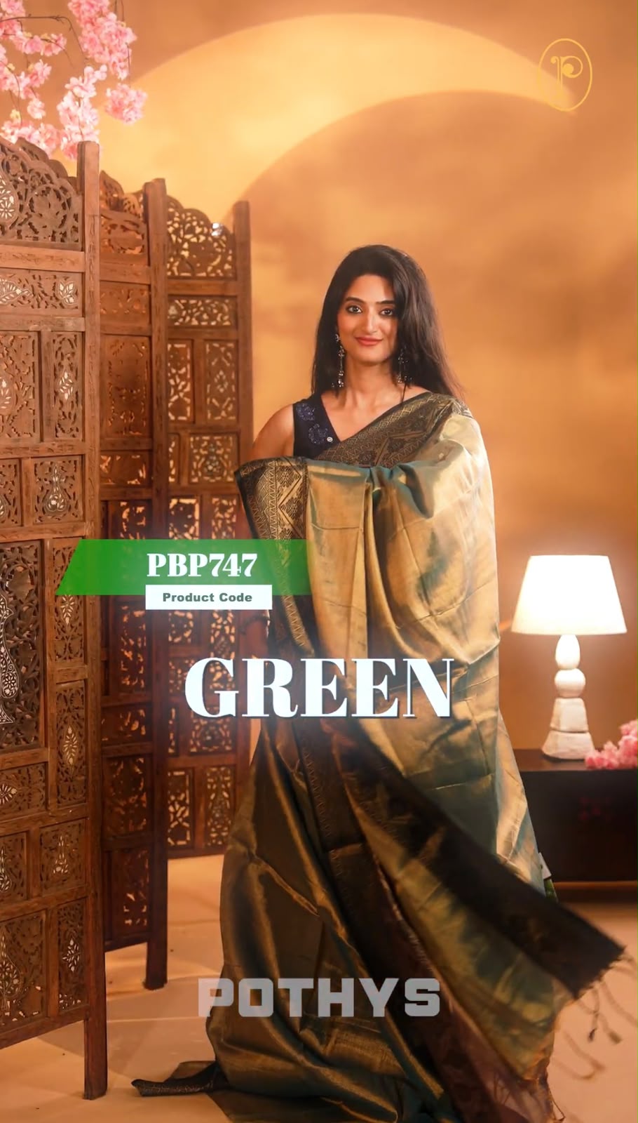 Green Colour Semi-Tissue Saree with a plain body and intricate thread work border.